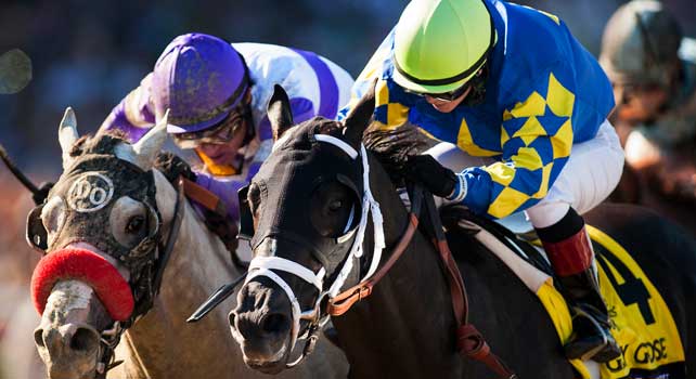 Shanghai Bobby and Rosie Napravnik (right) battle He's Had Enough and Mario Gutierrez to win the Breeders' Cup Juvenile at Santa Anita Park in Arcadia, California on November 3, 2012.