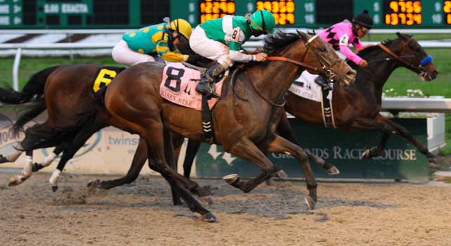 I've Struck a nerve ridden by James Graham edges out the competition to win the Risen Star Stakes Race at Fair Grounds Race Course in New Orleans, Louisiana on February 23, 2013.