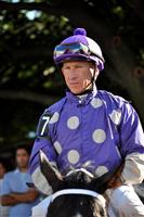 Jockey Charles C. Lopez