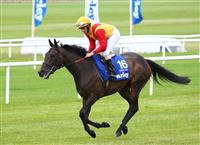 Snow Fairy with jockey Ryan Moore wins the Darley Irish Oaks at Curragh Racecourse.