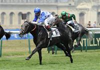 Reliable Man (no. 13) wins the 175th running of the Group 1 Prix du Jockey Club with Gerald Mosse at Chantilly Racecourse