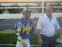 September 15, 2009: Jockey E J Perrodin with trainer Pat Mouton at Louisiana Downs.