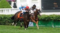23 May 2009 : Calvin Borel and BRASS HAT (orange) just up in time passes the favorite Spice Route to win the G3 Louisville Handicap at Churchill Downs in Louisville, Kentucky.