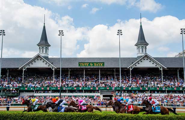 The field passes the Twin Spires the first time in the Churchill Downs Distaff Turf Mile on Kentucky Derby Day at Churchill Downs in Louisville, Kentucky on May 5, 2012.