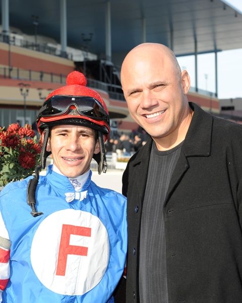 jockey Junior Alvarado and New York Yankees World Series Champion catcher Jim Leyritz, who made the Garland of Roses trophy presentation. 

 