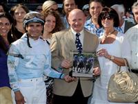 Jockey Alex Solis and United States Naval Captain and NASA astronaut Mark Kelly, husband of Congresswoman Gabrielle Giffords, after the seventh race at Saratoga Race Course on opening day, Friday, July 22. The race was named “The Gabrielle Giffords”