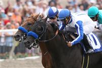 Tiny Woods wins his maiden debut for Bob Baffert with Mike Smith up