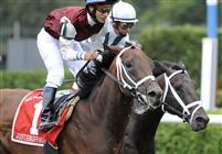 Justenuffhumor captures the 2009 Bernard Baruch at Saratoga with a late rush to sweep by Cowboy Cal
