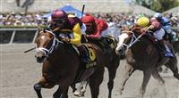 Travelin Man (no. 6), ridden by John Velazquez and trained by Todd Pletcher, wins the 26th running of the grade 2 Swale Stakes for three year olds on April 3, 2011 at Gulfstream Park in Hallandale Beach, Florida. (Bob Mayberger/Eclipse Sportswire) 