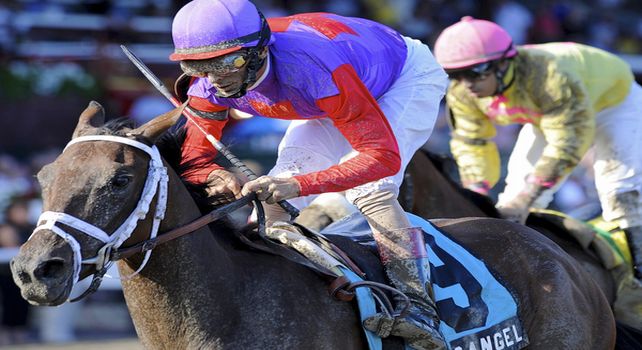 Georgie's Angel (no. 9), ridden by John Velazquez and trained by Todd Pletcher, wins the 93rd running of the grade 3 Schuylerville Stakes for two year old fillies on July 22, 2011 at Saratoga Race Track in Saratoga Springs, New York. (Bob Mayberger/Eclipse Sportswire) 
